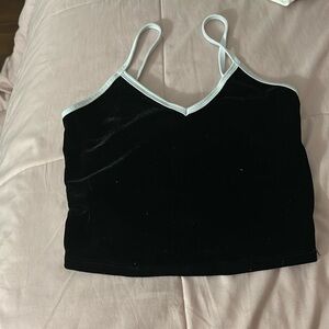 This is a good quality shirt, is a size xs , the color is black and it cost 5$